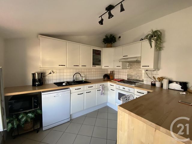 Afficher la photo en grand Appartement T3 à louer - 3 pièces - 70.0 m2 - VILLEFRANCHE SUR SAONE - 69 - RHONE-ALPES - Century 21 Coquillat Immobilier
